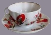 tasse à thé blanche à décor rouge - photo auteur inconnu